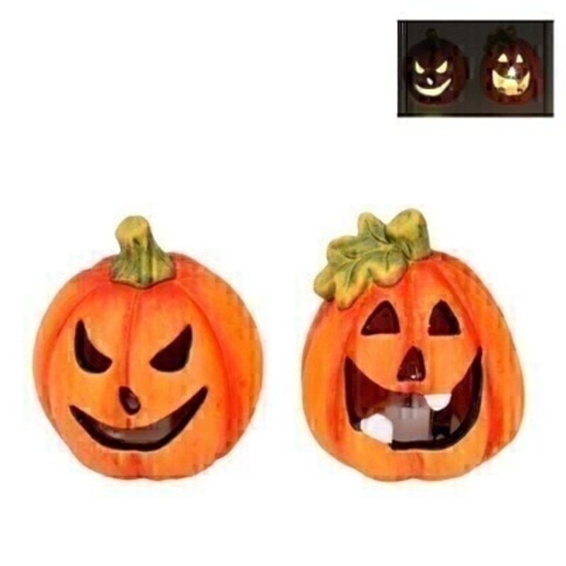 Choice of 2 Halloween LED Pumpkin Gisela Graham Choice of 2 orange ceramic Pumpkin ornament by designer Gisela Graham complete LED lights to give a spooky glow all night. The Halloween Pumpkins with two different faces to choose from is a great Halloween party decoration. Choice of 2 available - If you have a preference please specify when ordering. Would look great on your doorstep or in your window this October. The LED light is much safer than candle light and will light the ceramic pumpkin all night. Remember Booker Flowers and Gifts for Gisela Graham Halloween Decorations.